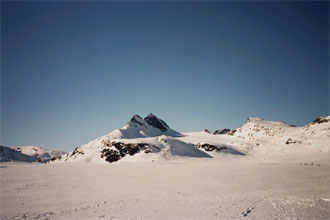 Looking North across Kvitevatnet, towards the Urdanosbreen glacier with Urdanostinded to the left